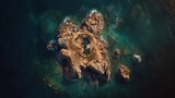 Aerial view of a rocky island with a hidden lagoon surrounded by turquoise waters creating a