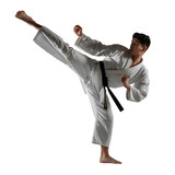 Karate Fighter in White Gi Performing High Kick, isolated on transparent background PNG