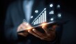 © C - Business person holding tablet with glowing chart and icons