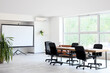© Pixel-Shot - Interior of conference hall with table, plants and projector screen