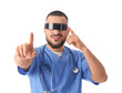 © Pixel-Shot - Male doctor in AR glasses using virtual screen on white background