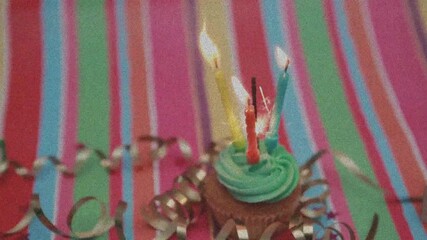 Wall Mural - animation of candles and sparkler on birthday cupcake