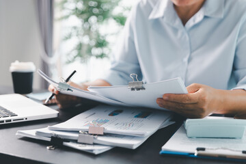 Business person with contract law and paper work for business finance, loan application form, contract real estate and insurance concept. signing contract, working on desk, business document