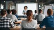© Harry - Engaged audience watches presenter delivering insightful business strategy in modern conference room