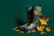 © apimagine - Fashionable dark green modern concept of women’s footwear, deep autumn boots in dark green color with a leaf print, stepping on yellow leaves. Illustration. Generative AI.