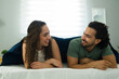 © AntonioDiaz - Charming couple relaxing and talking in bed together