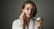 © Florence - Woman applying skincare cream on her face, showing a clean and fresh look