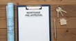 © crispy - Mortgage pre approval document on clipboard with house keys, blueprint, and pen. Concept of real estate purchasing and home loan financing.