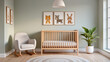 © AliRza - A cozy, modern baby nursery with soft green walls. A wooden crib stands in the center, flanked by a rocking chair and a leafy plant. The wall art with animal prints adds a playful, charming touch.