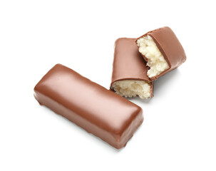 Wall Mural - Tasty chocolate covered coconut candies on white background