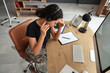 © Pixel-Shot - Tired female African-American soldier working with headset at headquarters