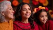 © Margarita Ratatosk - Happy multigenerational Latin american and mexican women celebrating Day of the Dead, traditional family holiday decor and autumn colors.