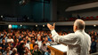 © Donna - A pastor preaching to a large congregation