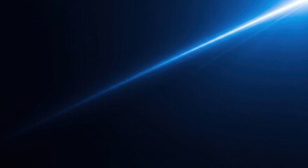 Abstract blue diagonal light streak with bokeh particles on