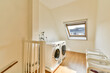 © ADDICTIVE STOCK - Modern Laundry Room with Natural Light