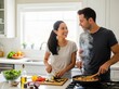 © Eira - Couple Cooking Together at Home Preparing a Healthy and Delicious Meal