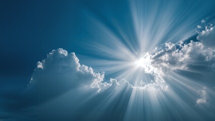 bright sun rays piercing through fluffy white clouds in a clear blue sky with dramatic sunlight beam