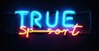 © antishock - Neon sign displays TRUE Sport. Blue outlines top text, red illuminates bottom. Dark background emphasizes bright glow.
