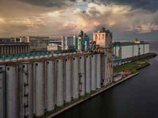 Wall Mural - Industrial Grain Silos at Sunset