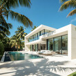 © DexignBuzz - Modern luxury villa with swimming pool and palm trees under blue sky