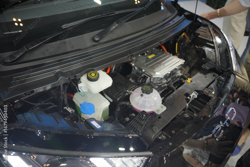 Engine compartment of a BYD car featuring electric motor components on ...