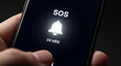© Andres Mejia - Hand activating sos emergency alert on smartphone for 24 hours