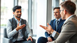 © James - Focused young indian job seeker self-presenting on interview with confident european hr manager or company leader. Skilled multiracial manager giving professional consultation to client in office.