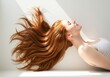 © Kailom - Dynamic hair toss captures joyful movement and expressive freedom in a natural light setting