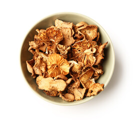 Wall Mural - green bowl with tasty dried mushrooms on white background