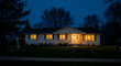 © Muaz - A house with a subtle glow emanating from within its windows