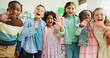 © BuyOutFelix03/peopleimages.com - Excited, portrait and children with wave in classroom together for learning, growth or development. Friends, smile and happy student kids in back to school class for education, knowledge or academics
