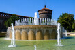 Castello Sforzesco, medieval castle in Milan, Italy, with the fountain