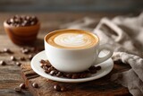A white latte cup with coffee beans on a rustic wooden surface