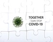 © andra - Puzzle pieces with a virus graphic and text advocating unity to stop COVID-19