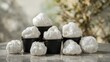 © Cyber Shutter - Black plastic containers filled with white rubber latex, rubber chunks inside