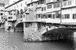 Ponte Vecchio - landmark of Florence, Italy. Black and white photo vintage style.