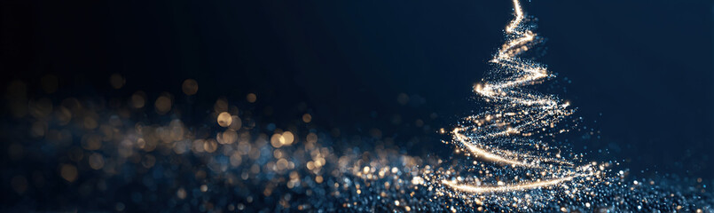 Sparkling abstract Christmas tree made of glittering particles against a dark blue bokeh background; festive digital art.