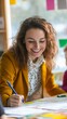 © Oleksandr - Cheerful young professional in yellow blazer smiling while writing and working on creative project in bright, colorful office space