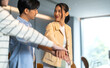 © Art_Photo - Asian business team stacking hands over office desk with teamwork and unity concept, collaboration in workplace, startup planning, cooperation goal and support motivation success, business success