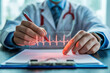 © kiatipol - Doctor stethoscope heartbeat electrocardiogram medical healthcare clipboard pen uniform analysis close up professional hospital cardiology diagnosis technology futuristic monitoring pulse data
