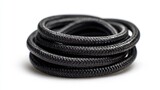 Coiled black braided cable on a white background