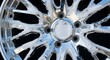 © golekduetdolaR - Chrome alloy wheel undergoing a thorough cleaning with foaming detergent.