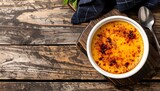 Top view of classic French crème brûlée in a round ramekin