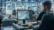 © Gorodenkoff - Advanced Manufacturing: Team of Engineers Collaborate on Design of Robotic 3D Assembly Line. Screen Shows Software Automated Production Process, Optimizing Industrial Facility Layout