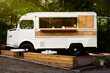 Street coffeeshop bus in the summer park	