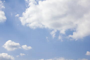Wall Mural - the sky is covered with fluffy clouds.