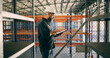 © Kobus L/peopleimages.com - Inspection, schedule and tablet with construction worker man in warehouse for agenda or checklist. App, industry and planning with person in storage depot for maintenance, management or manufacturing