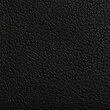 © sarlina - A close-up showcases a textured, dark surface with deep, intricate patterns. The rough grain gives it a tactile, organic quality. Monochrome and detailed