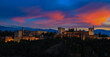 The landscape  view with Alhambra of Granada, Spain. Alhambra fortress and Albaicin quarter at twilight sky scene