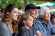 © Sana - Multi-generational family watching cricket match together